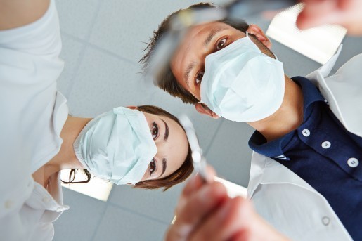 patient looking at dentist